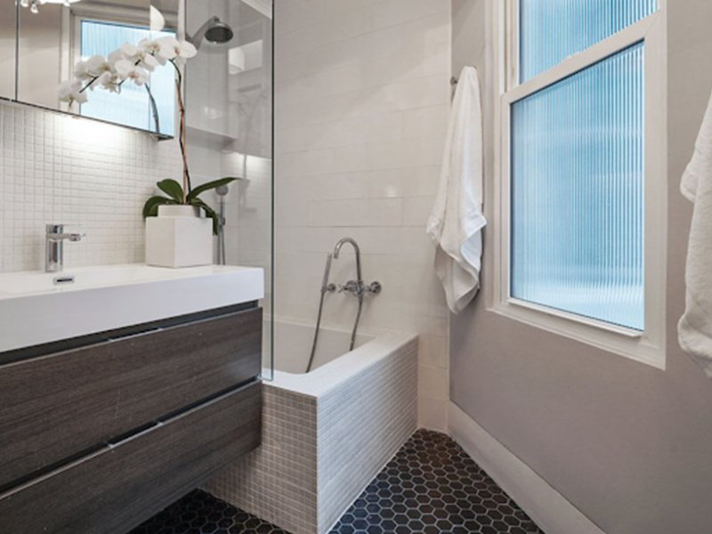 White bathroom with high end finishes