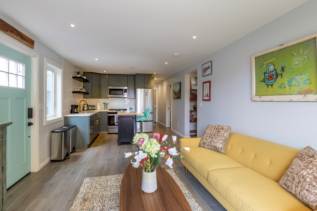 Small joined living space with kitchen and living room