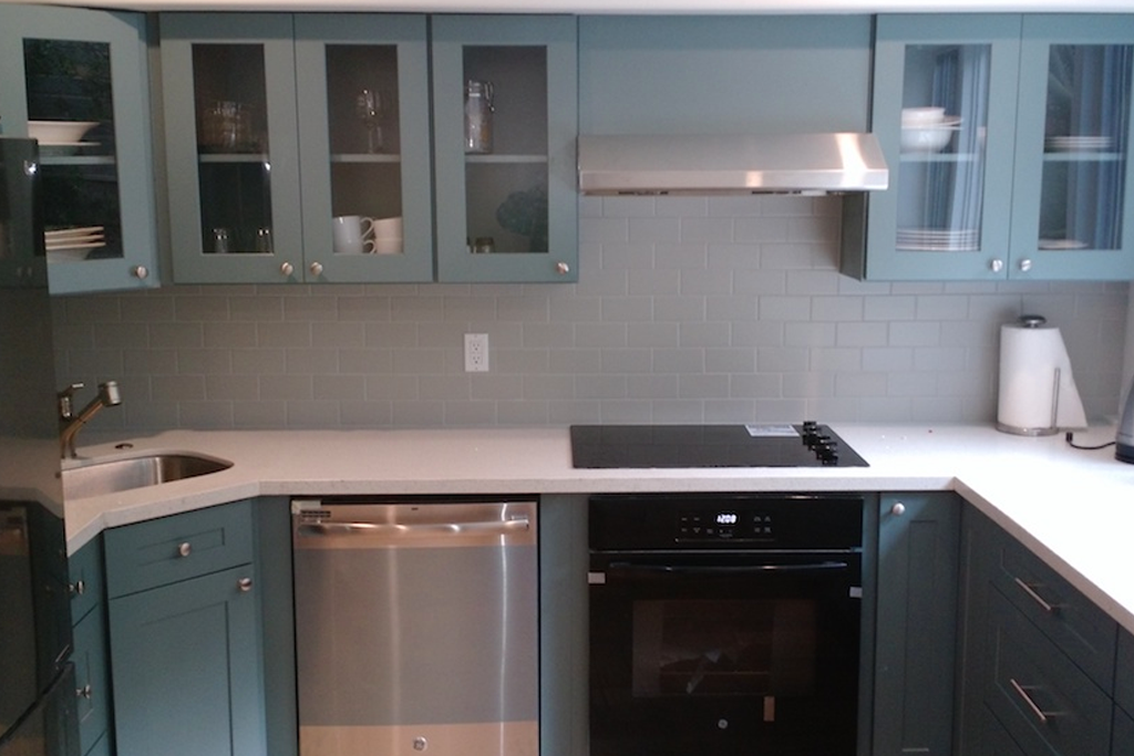 Modern kitchen with cabinets in blue