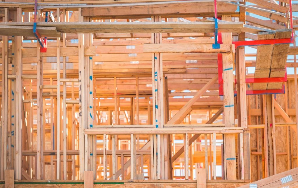 Residential wood framing exposed during seismic retrofitting to correct structural weaknesses and improve earthquake resistance.