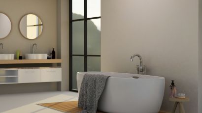 Modern bathroom remodel with a soaking tub, dual vanity sinks, smart storage features, glass walls, and a neutral color palette
